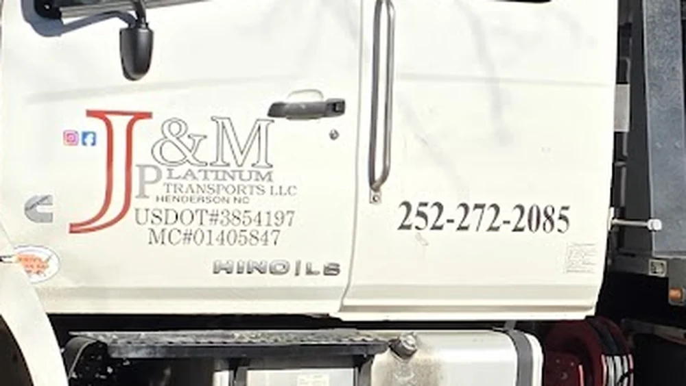 The J&M Platinum Transports door decal, reading Henderson NC and USDOT 3854197